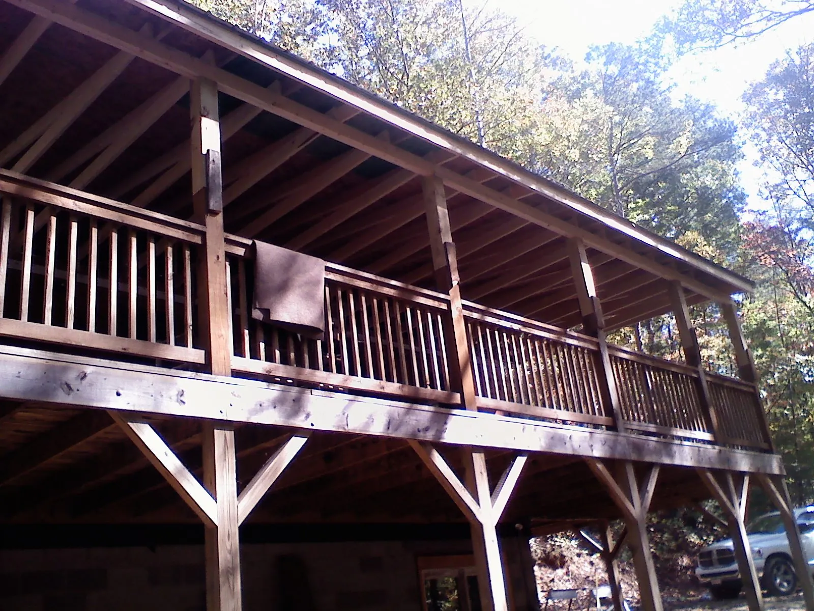 Timber framing under a new elevated porch and deck — Roof Leak Repair in Maury City by Roofing Brothers